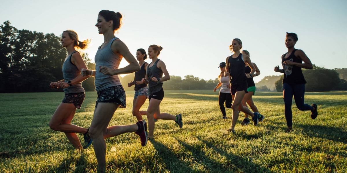 women running in field