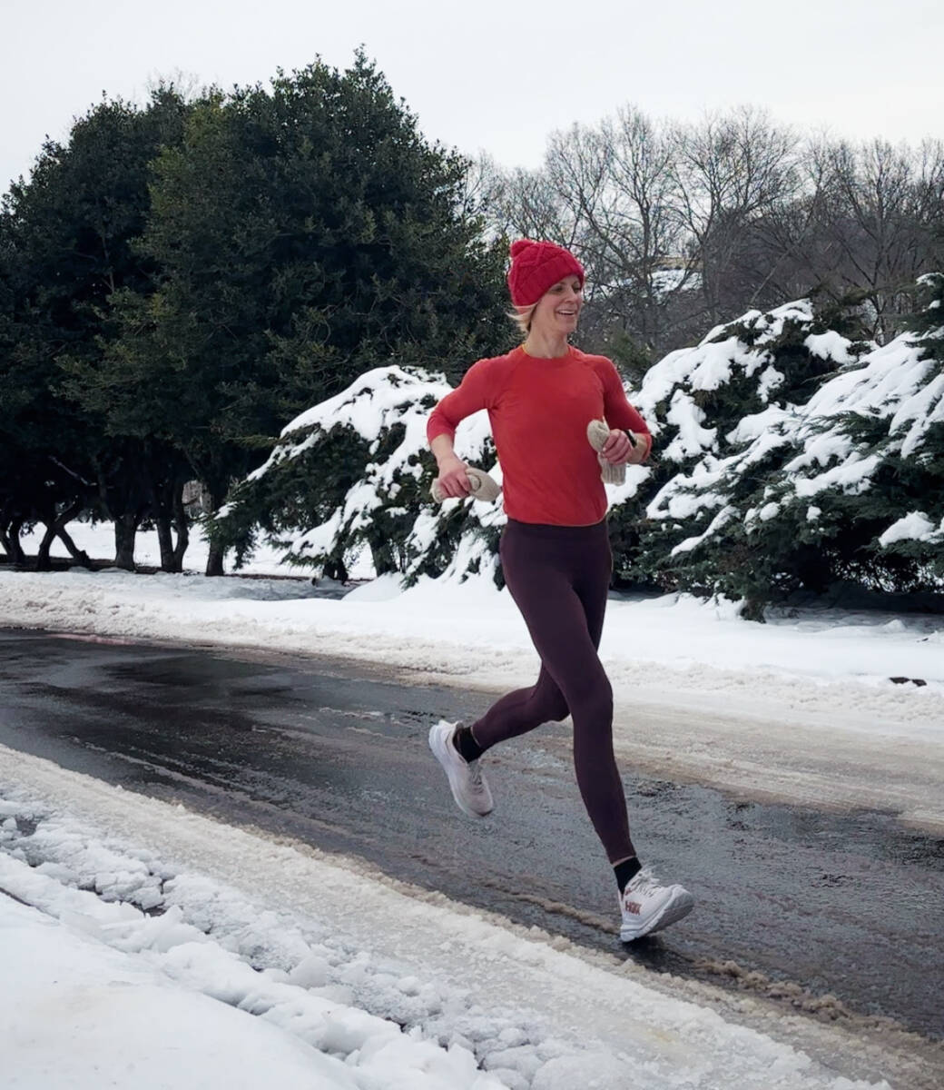 Whitney running in snow