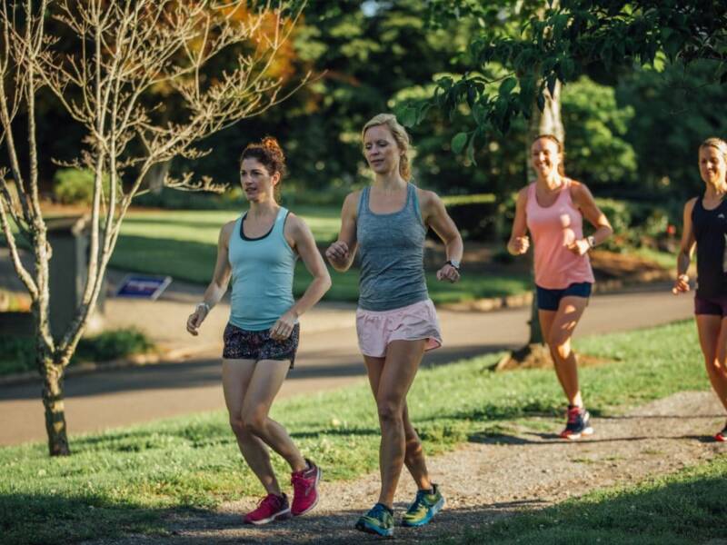 women running on a path