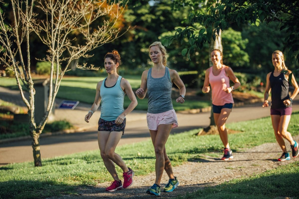 women running on a path