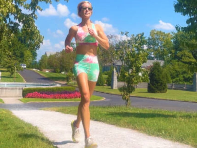 whitney running in tie dye outfit