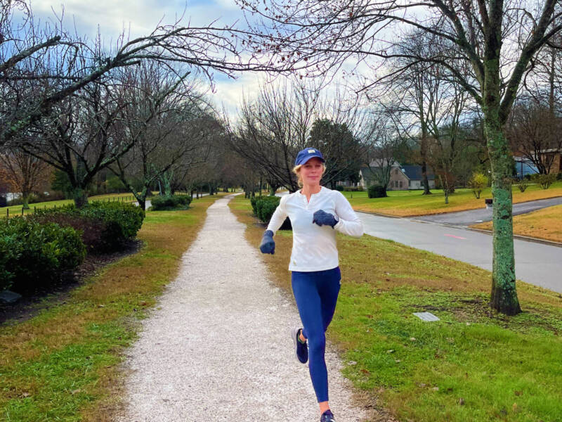 whitney running on path in winter