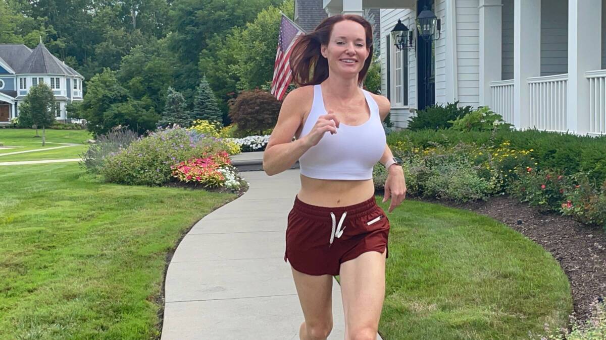 woman running in sports bra