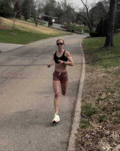 whitney running down a hill