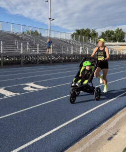 Neely sets the stroller mile world record in Colorado.