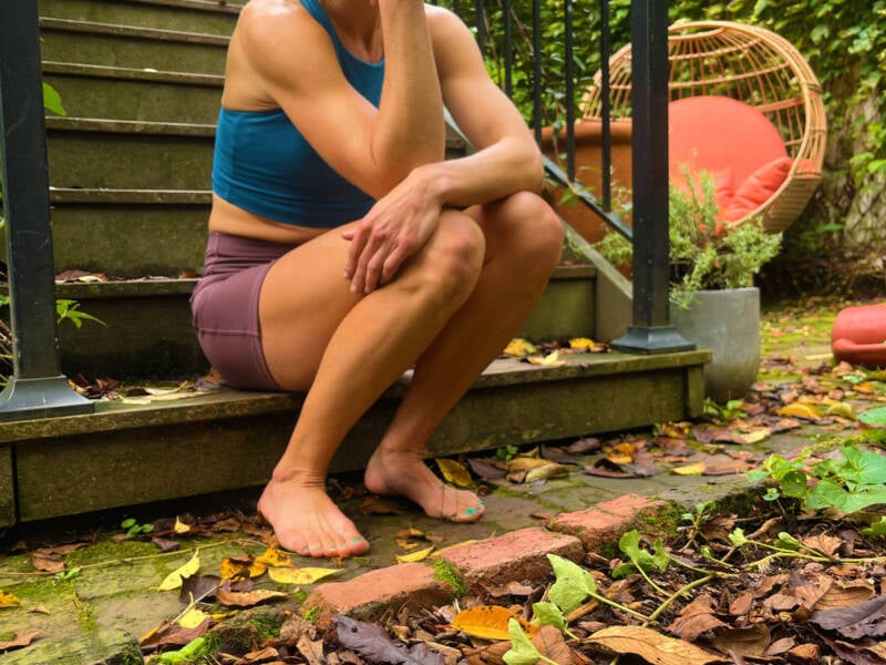 whitney heins battling post-injury depression sitting on steps sad