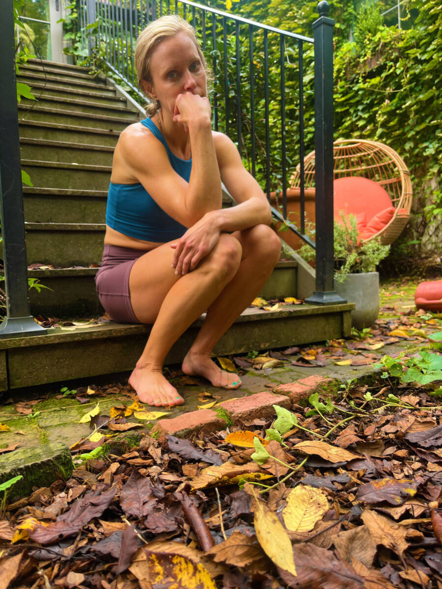 whitney heins battling post-injury depression sitting on steps sad