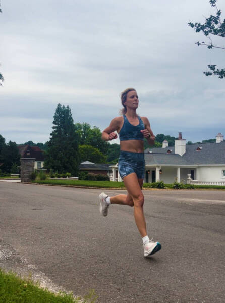 whitney running in blue outfit