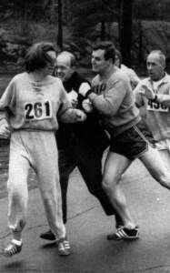 Jock Semple trying to push Kathrine Switzer off the Boston Marathon course.