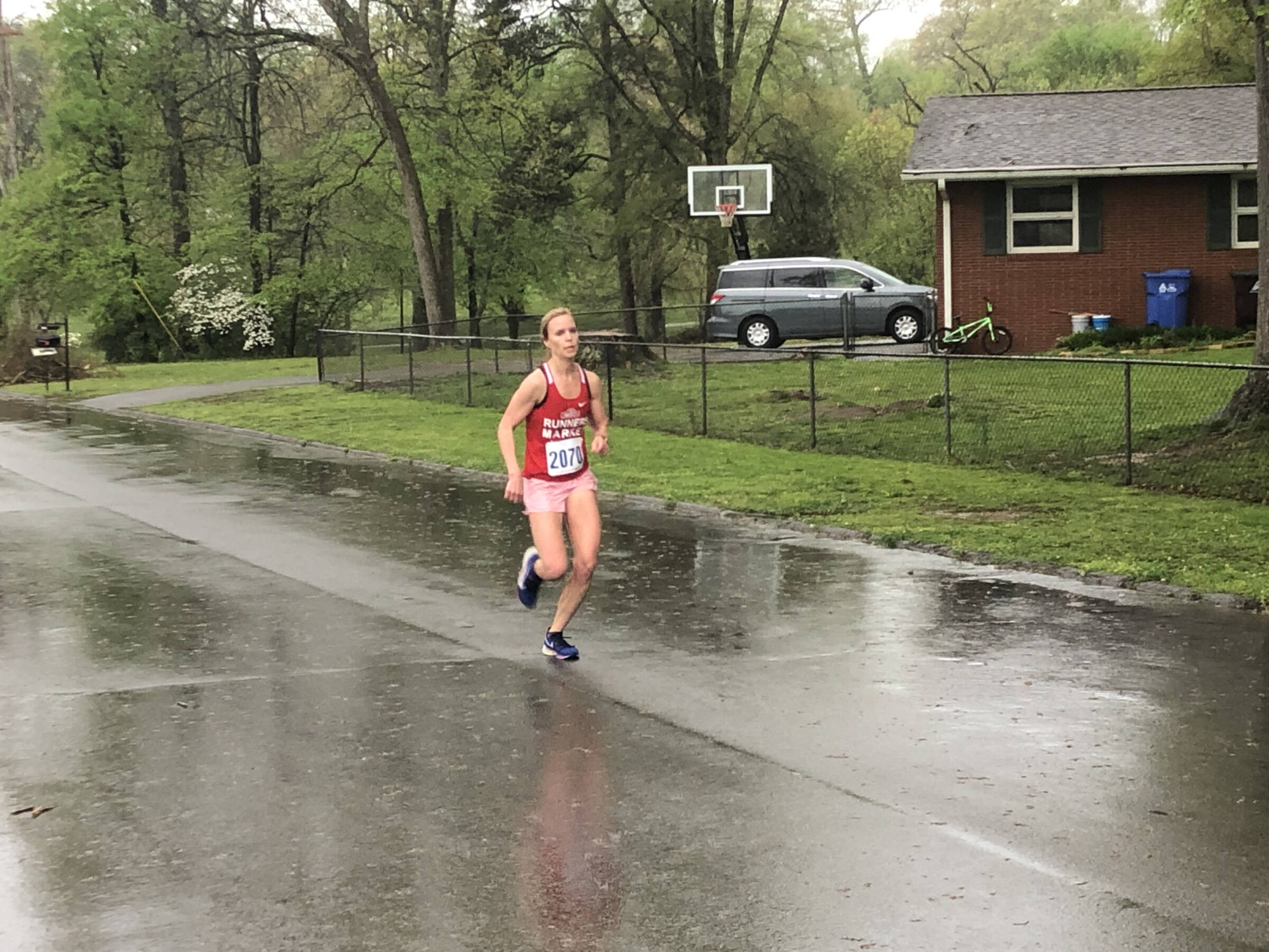 whitney running in the rain