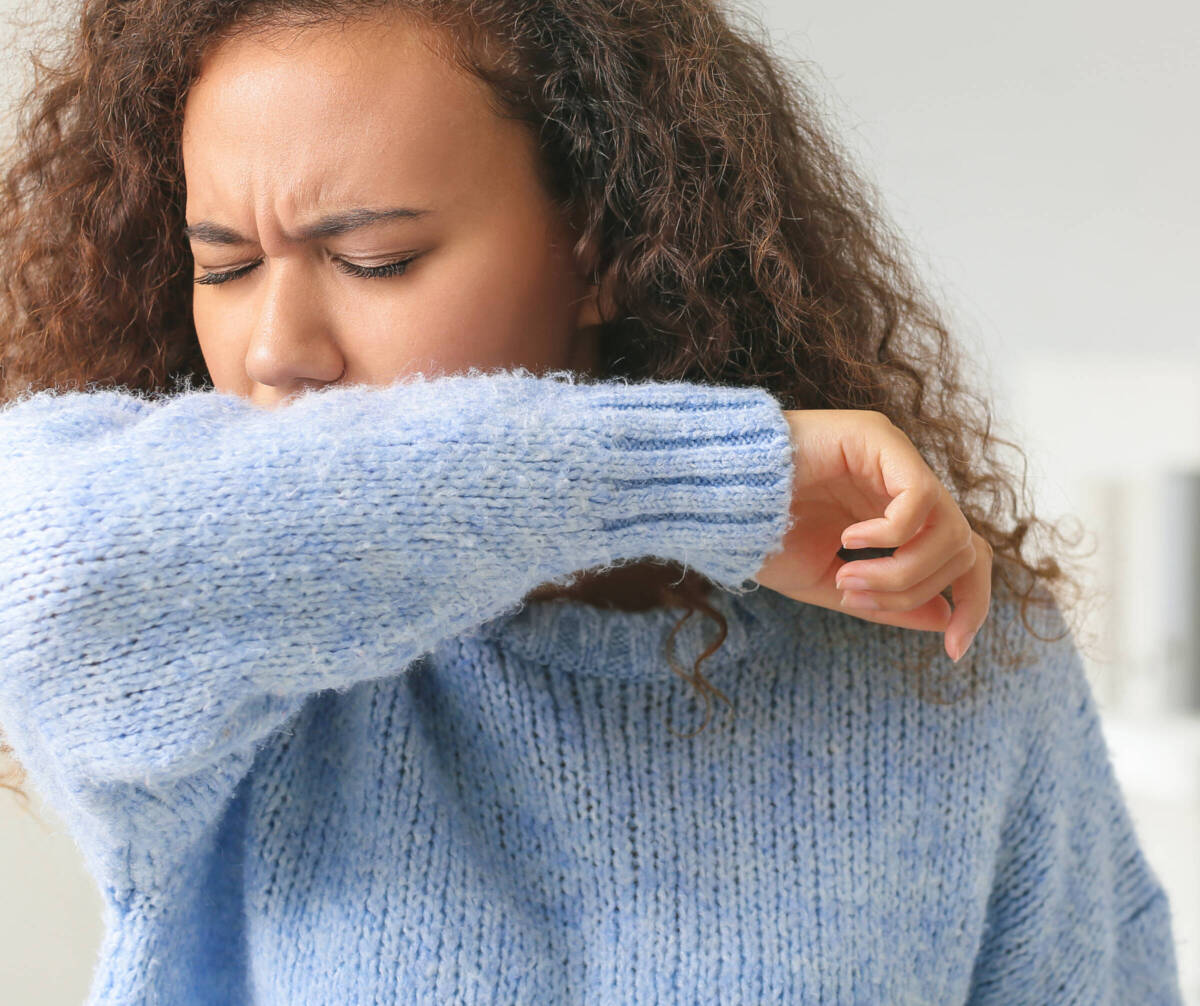 woman coughing