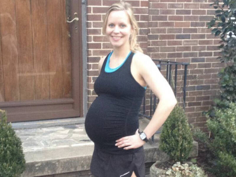 Whitney pregnant in running clothes