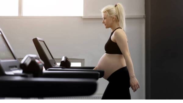 pregnant runner on treadmill