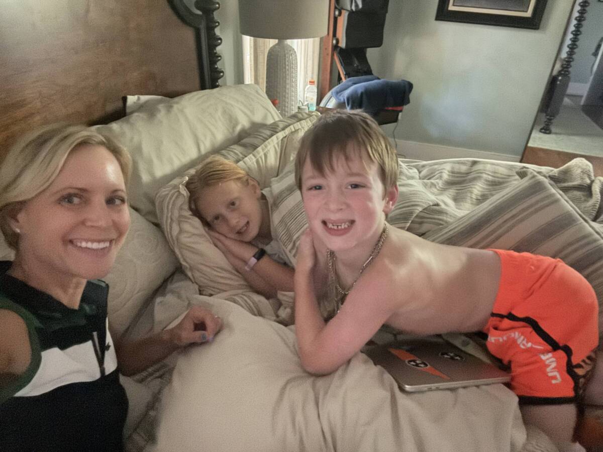 whitney with her kids sick in bed