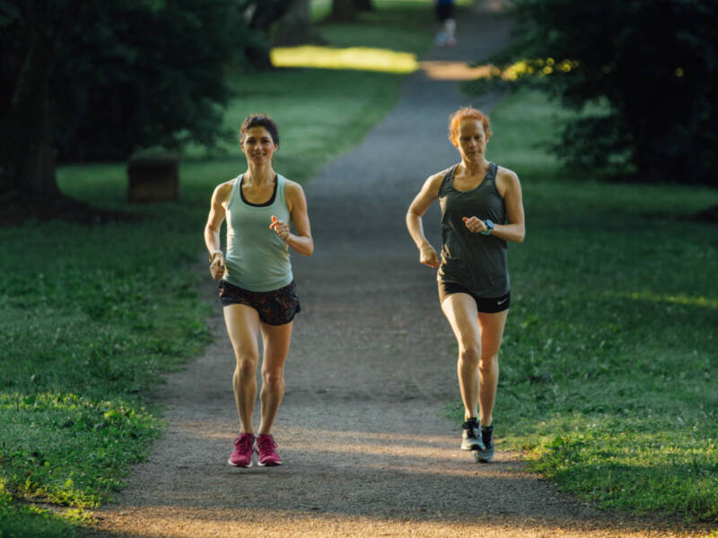 women running on a path